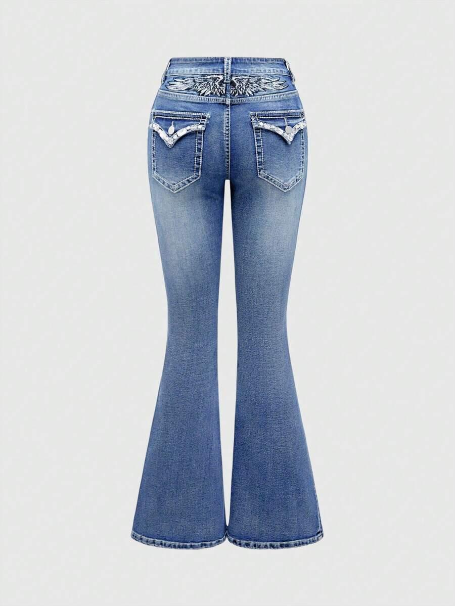 niebieskie spodnie jeans zdobienie