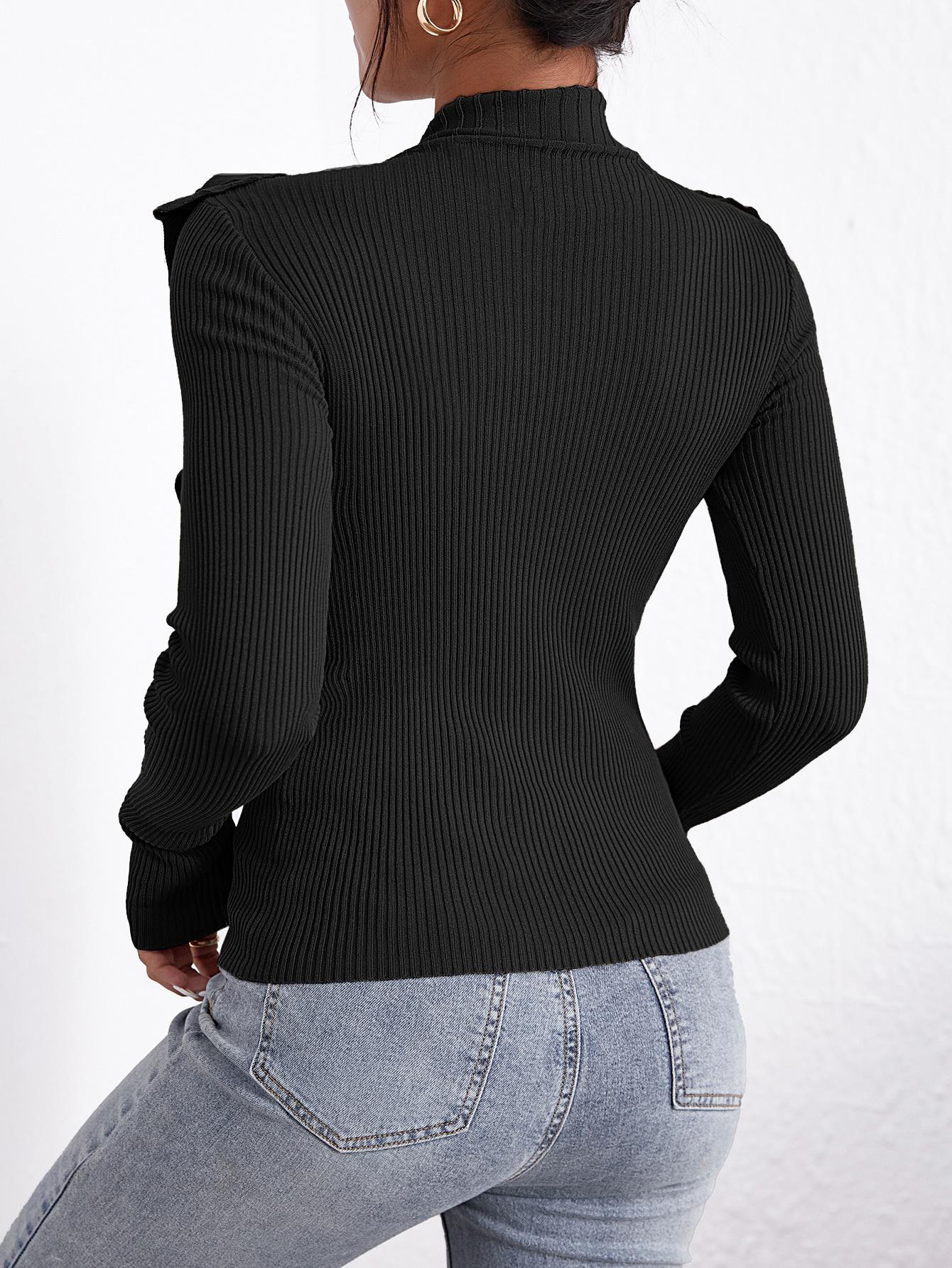 czarny sweter falbany 