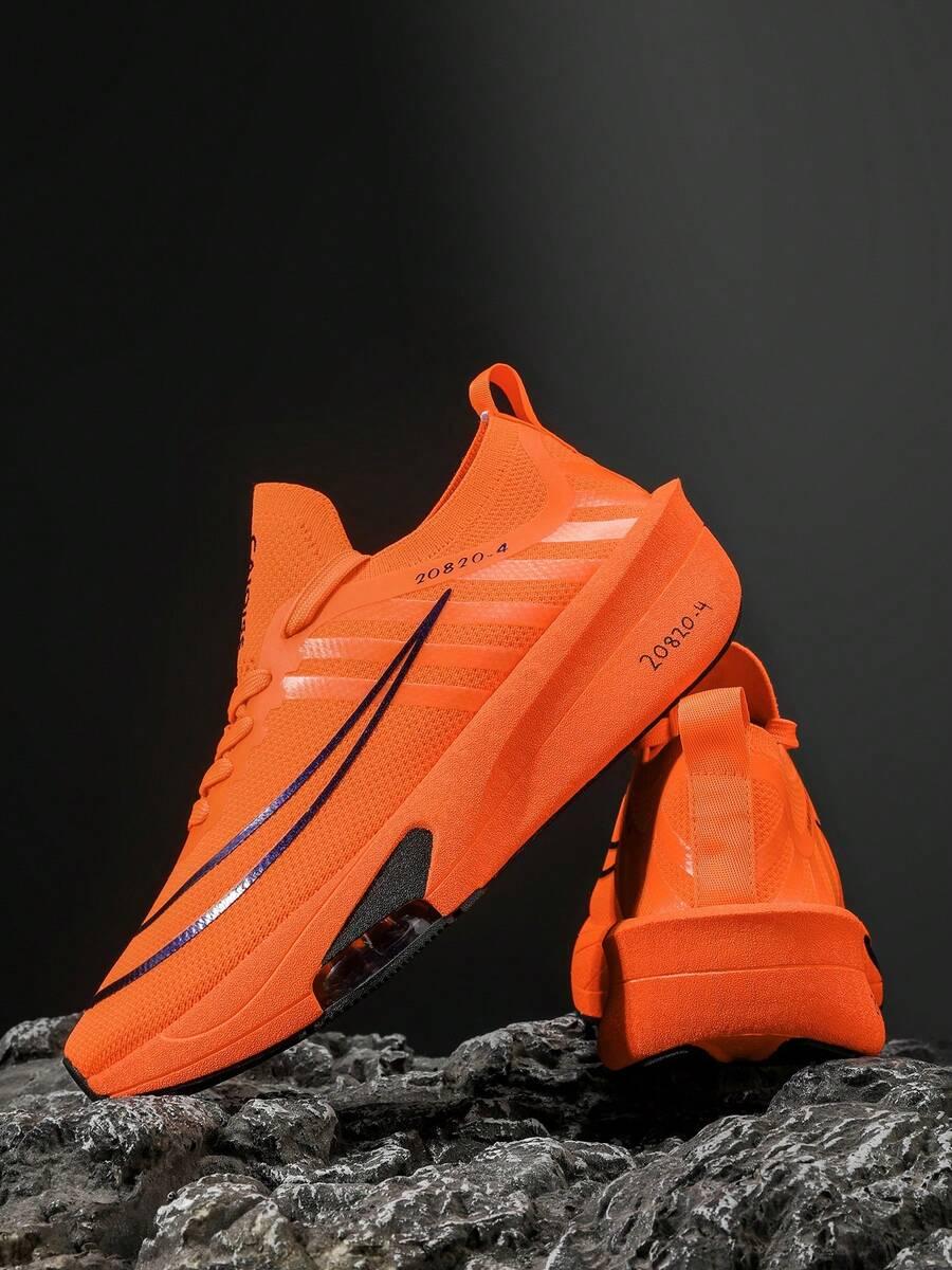 pomarańczowe buty sportowe