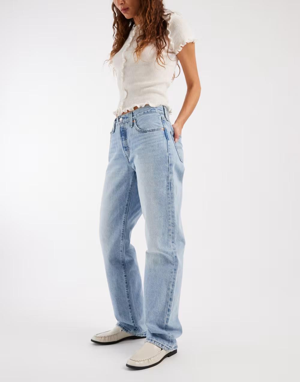 niebieskie  spodnie jeans logo
