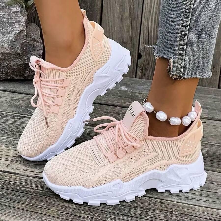 różowe sznurowane buty sportowe