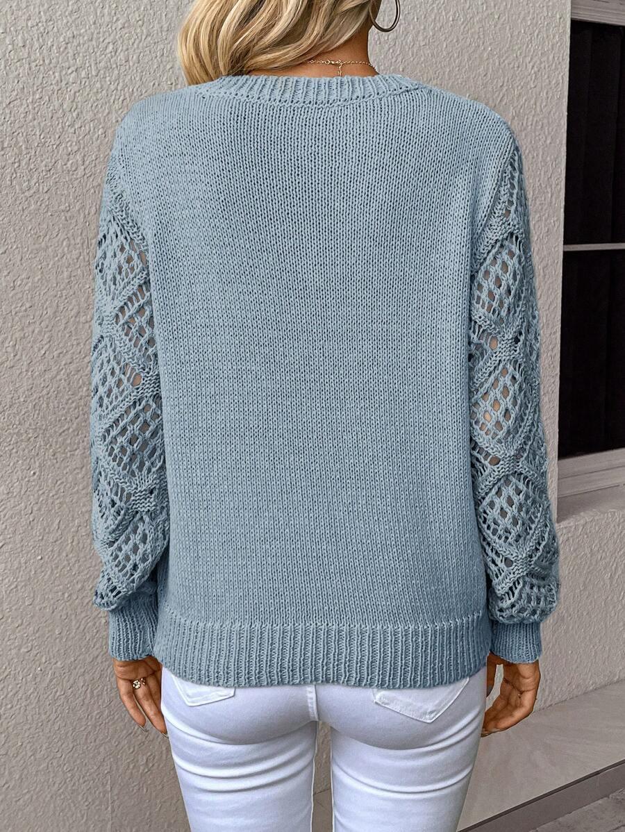 NIEBIESKI SWETER PRĄŻKI V-NECK