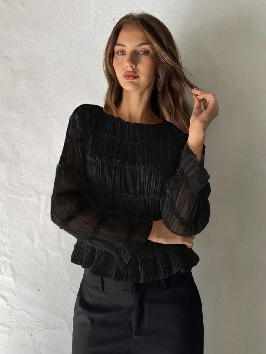 czarna bluzka falbanki