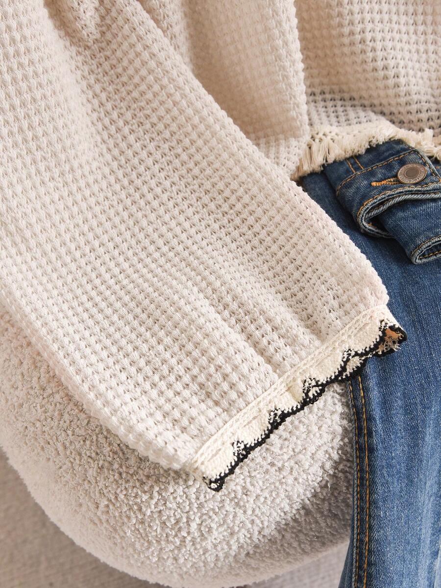 beżowy dzianinowy sweter