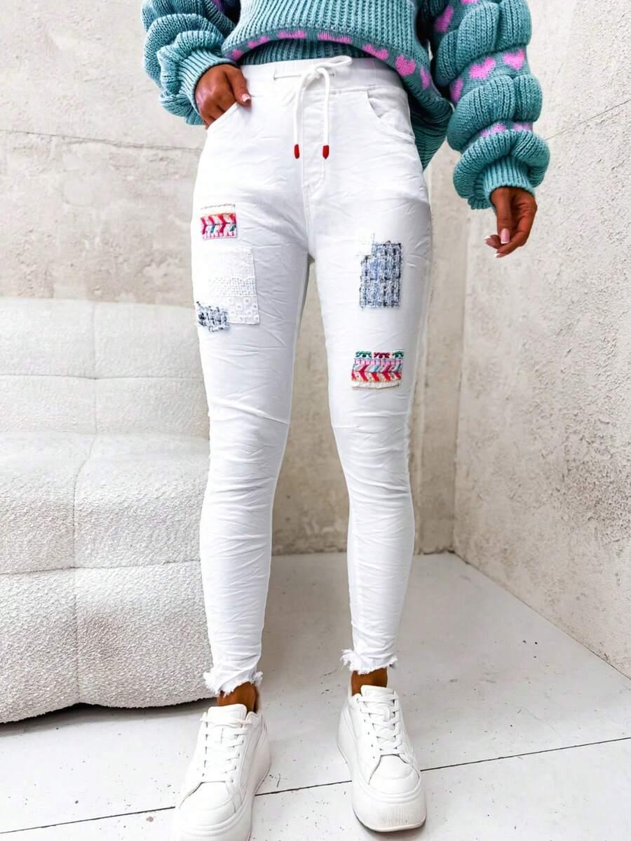 BIAŁE SPODNIE JEANS
