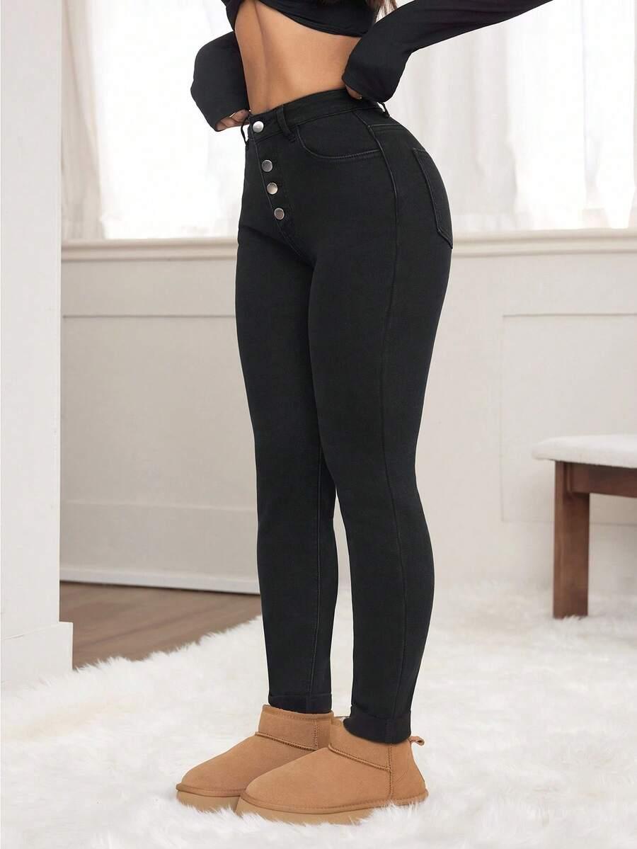 CZARNE OCIEPLANE SPODNIE JEANS RURKI