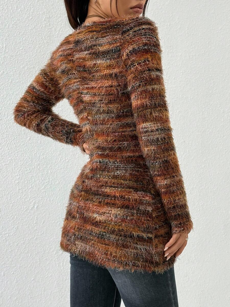 sweter guziki frędzle