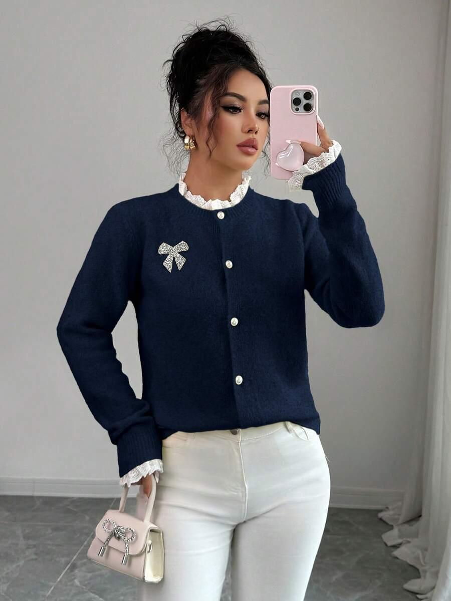 granatowy sweter długi rękaw