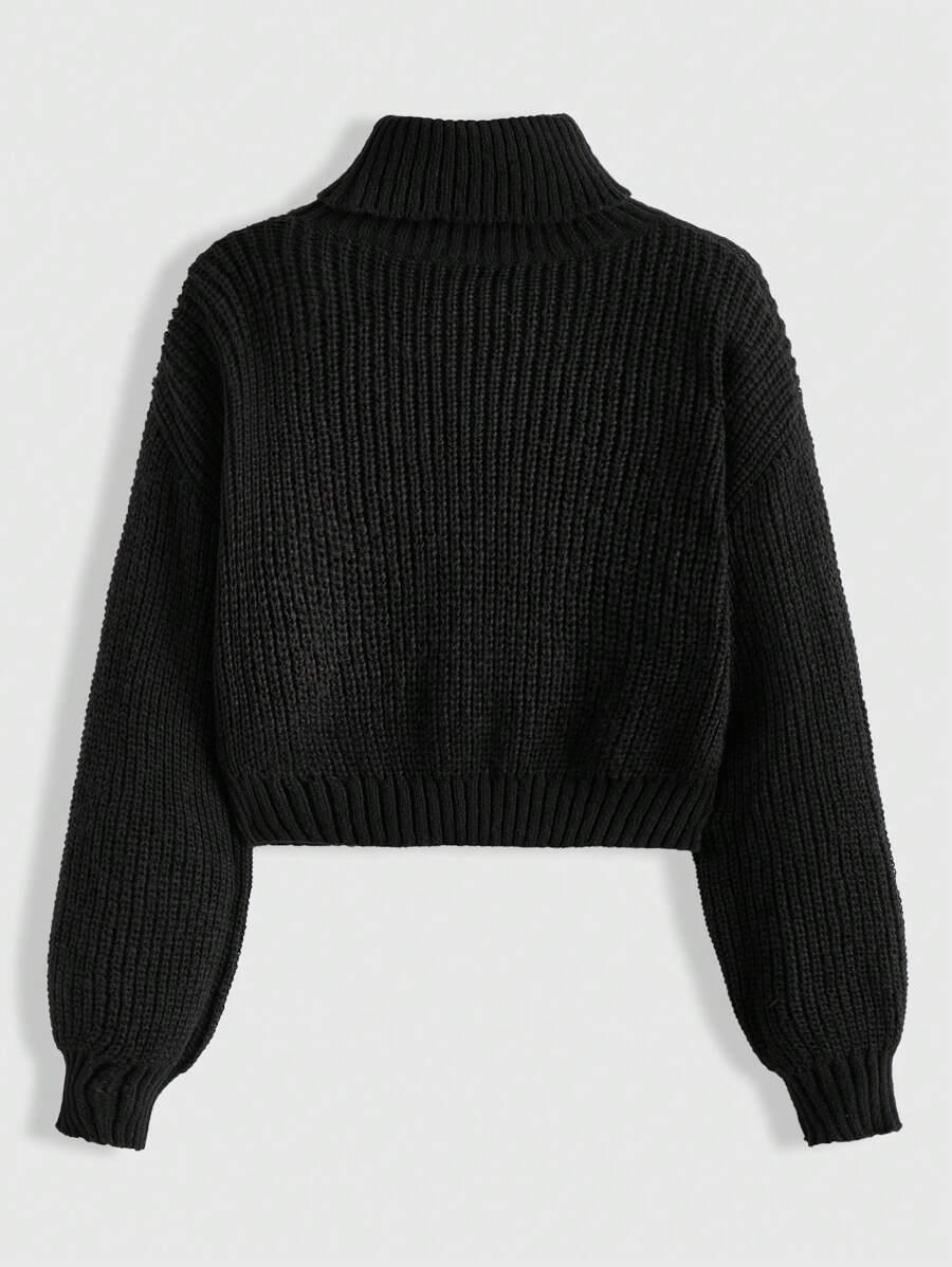 czarny sweter wzór