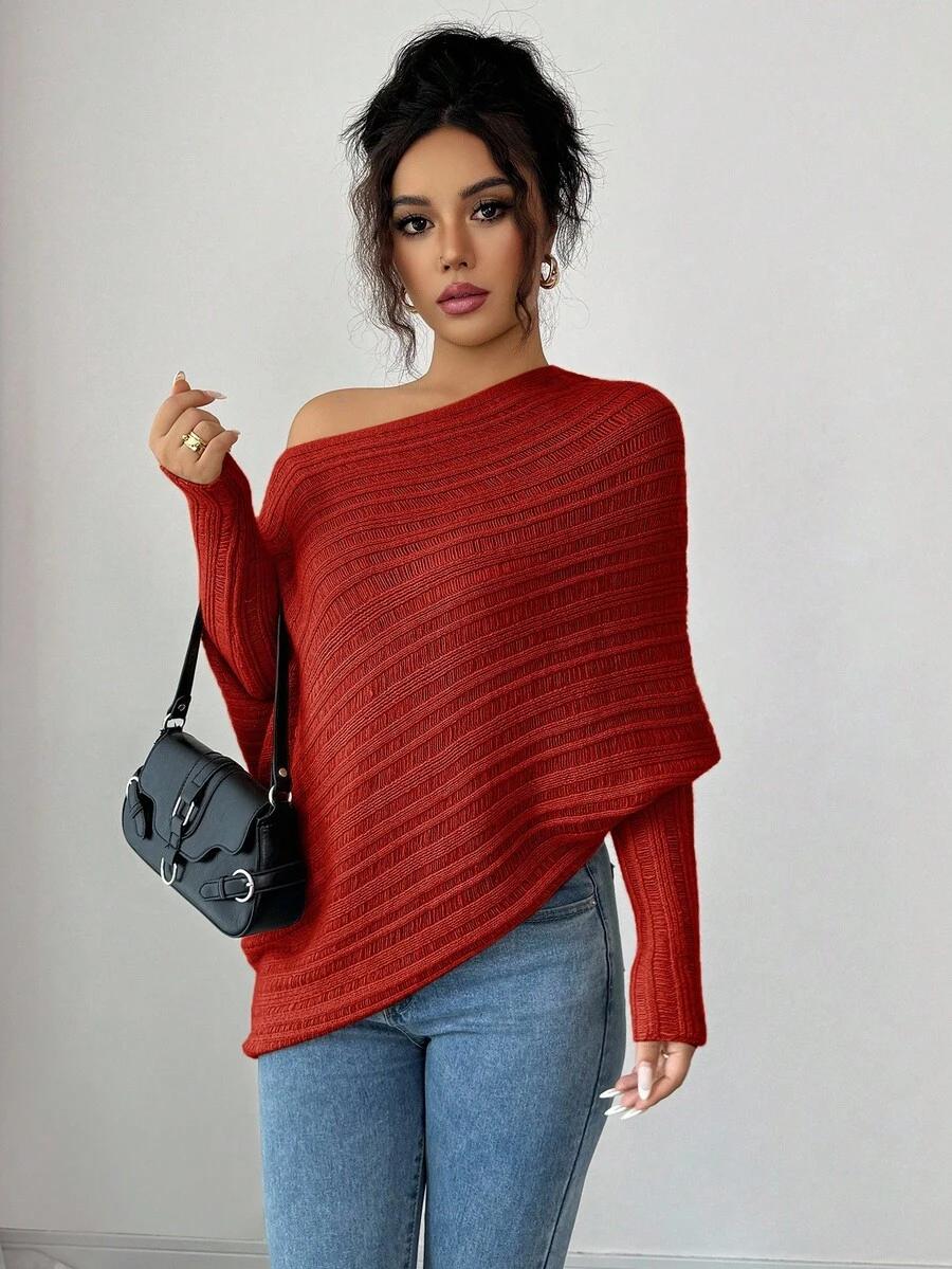 pomarańczowy sweter asymetryczne dekolt