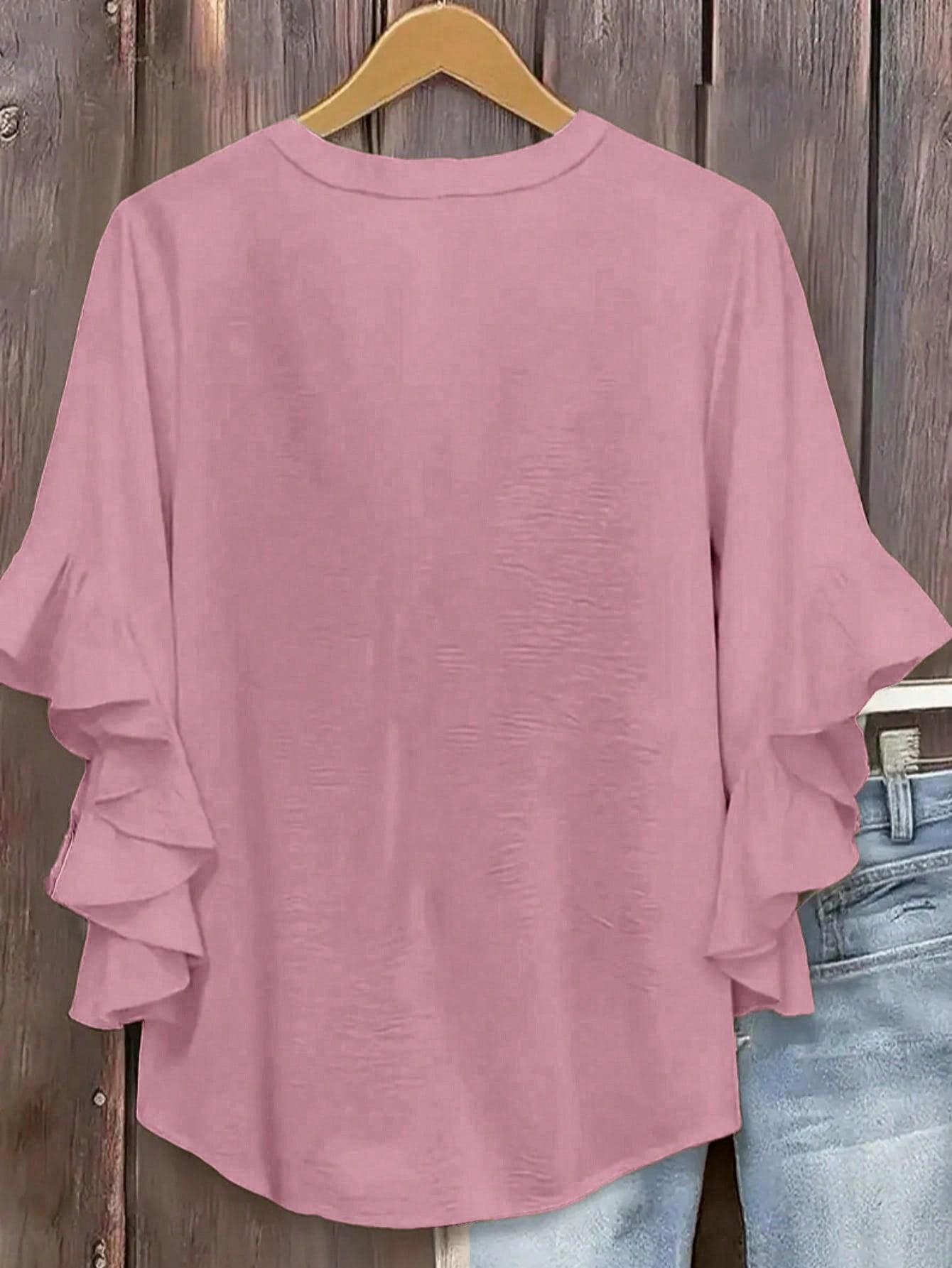 różowa bluzka v-neck