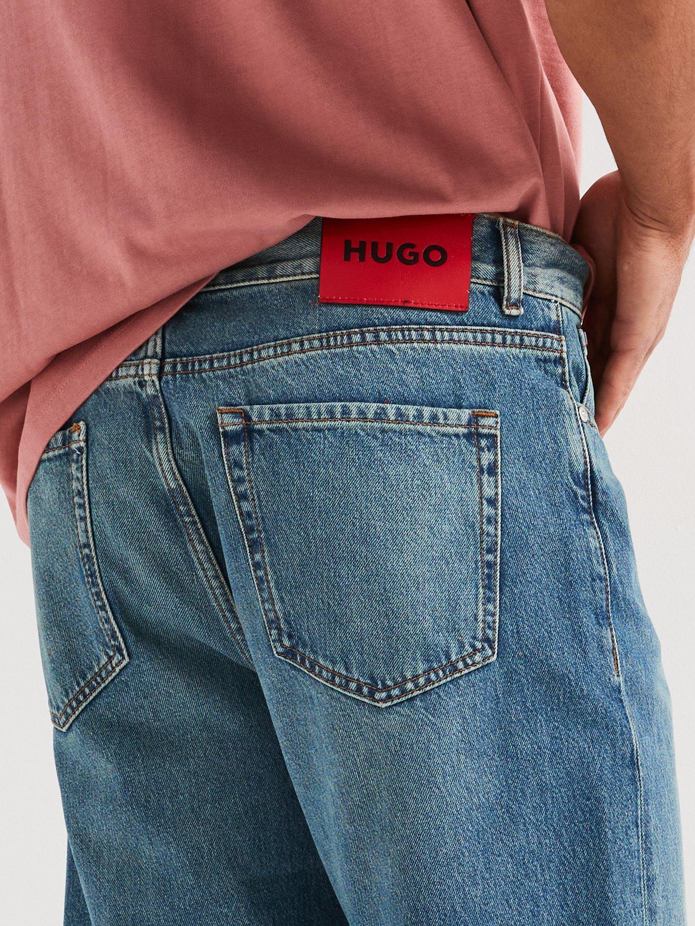 HUGO 838 JEANSY MĘSKIE O LUŹNYM ZWĘŻANYM KROJU 50533616