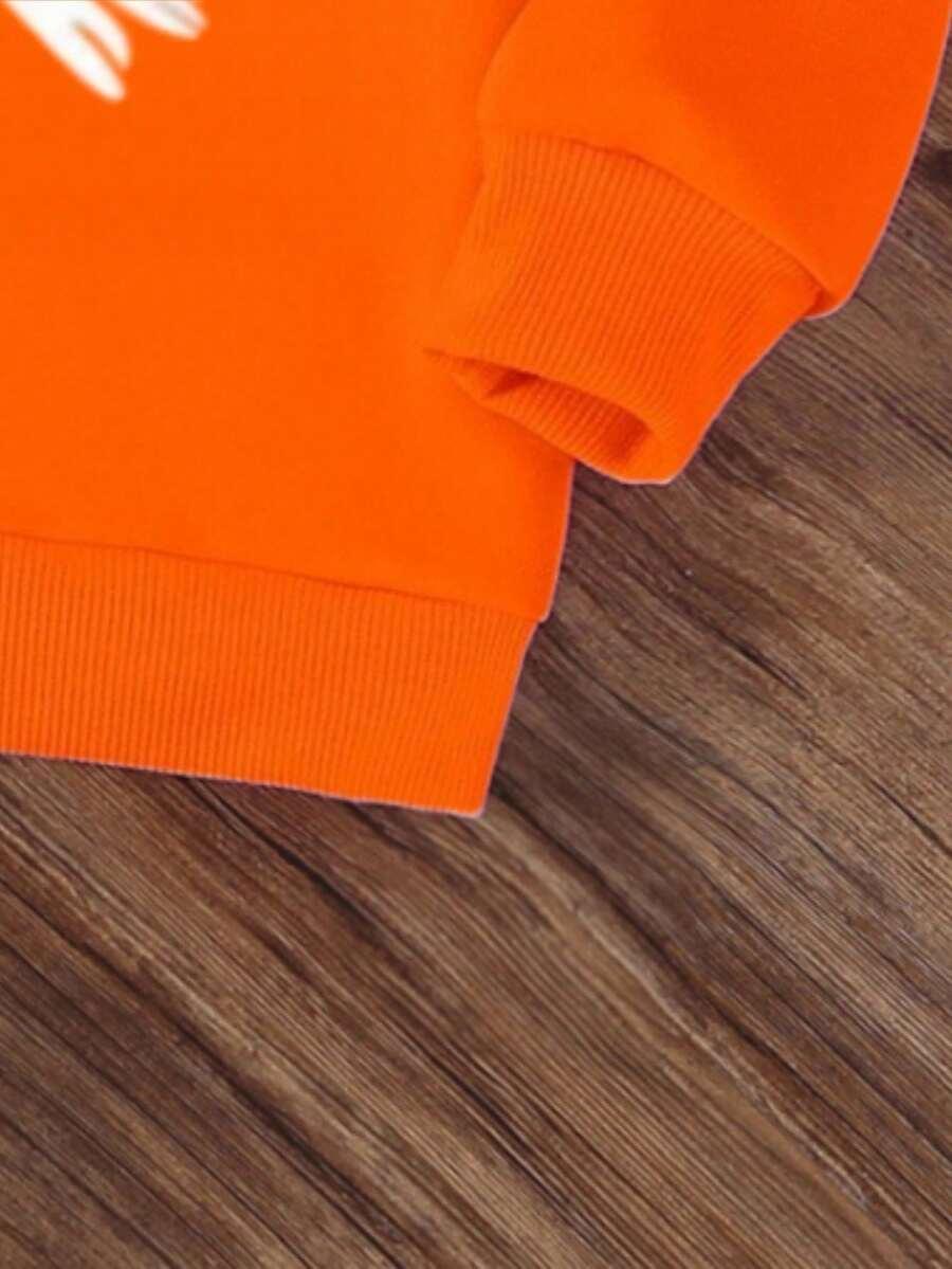 pomarańczowa bluza print
