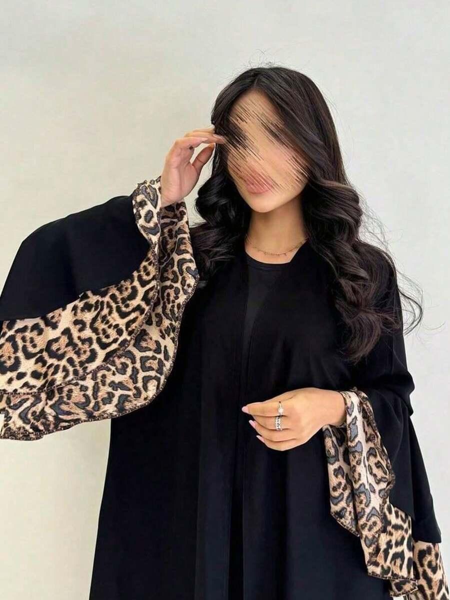 czarna narzutka łączenie animal print