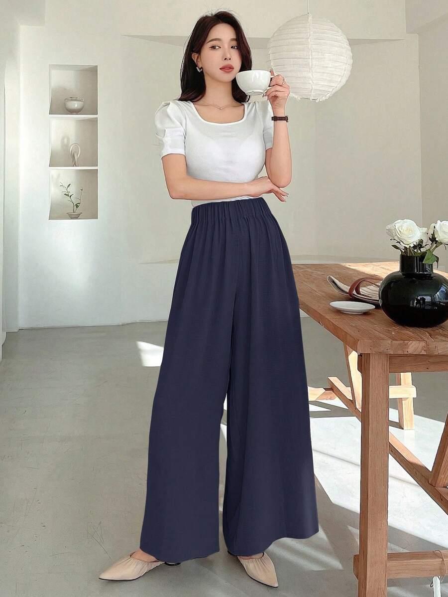 granatowe spodnie wide leg