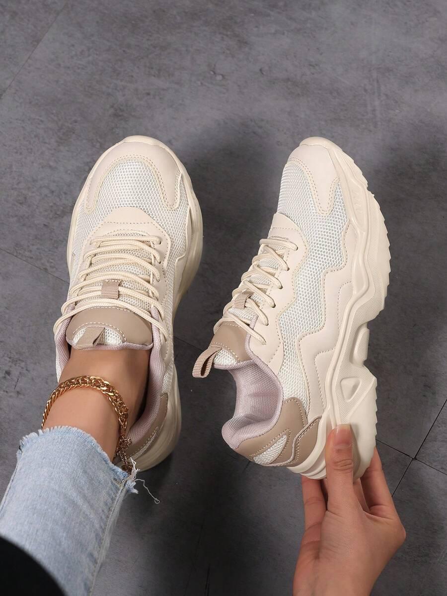 beżowe sznurowane buty sportowe