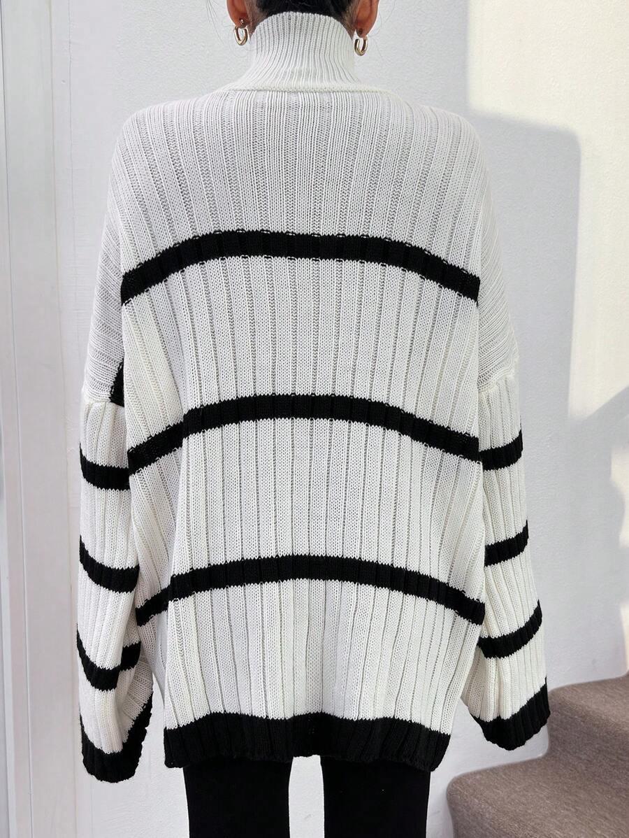 sweter szerokie rękawy paski