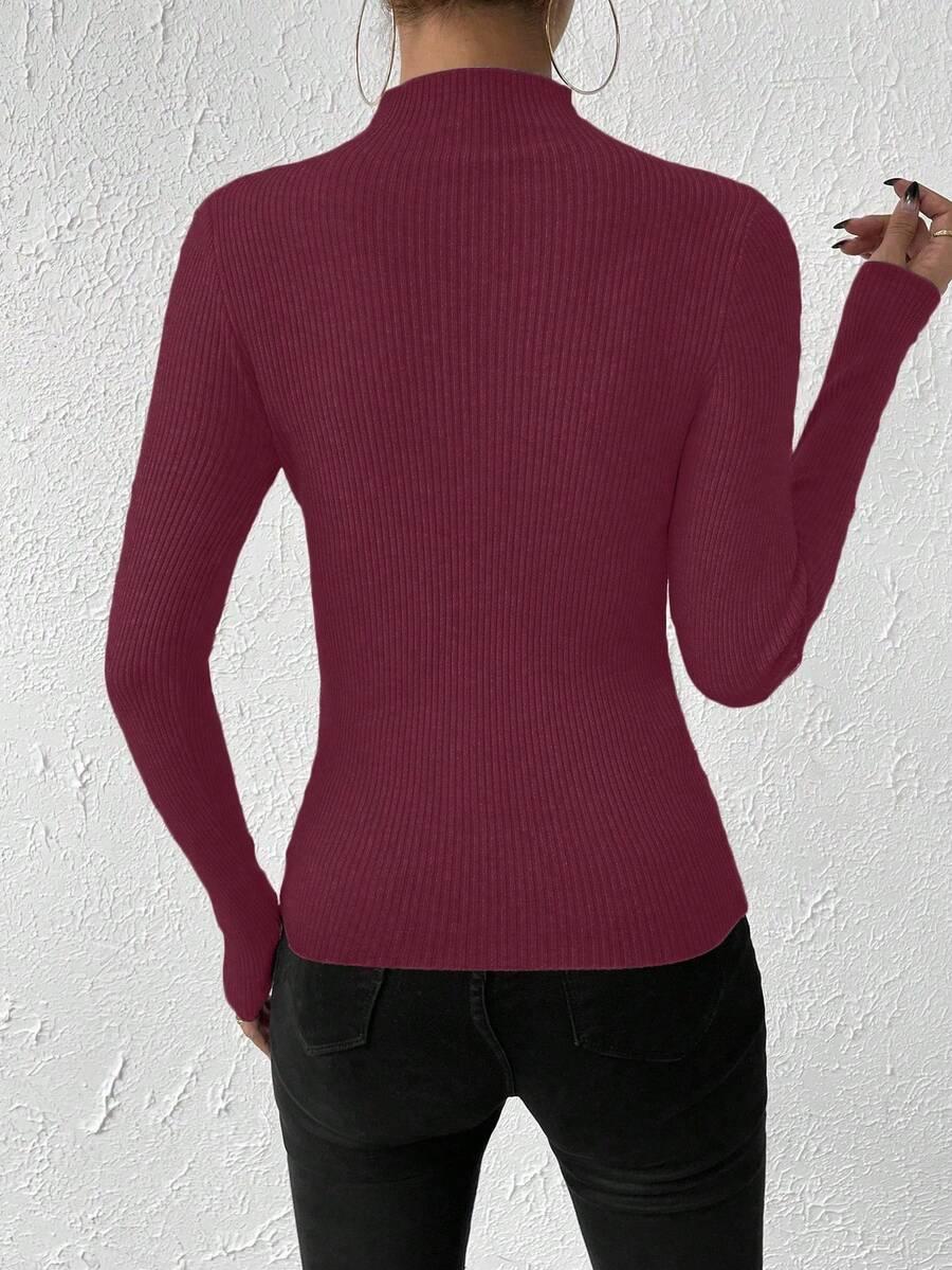 czerwony sweter prążki