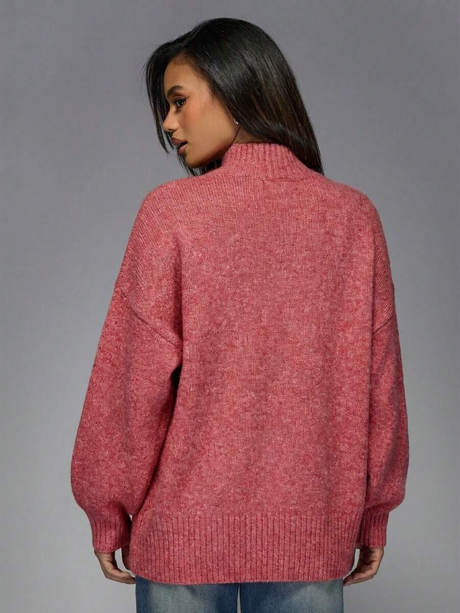 różowy sweter guziki
