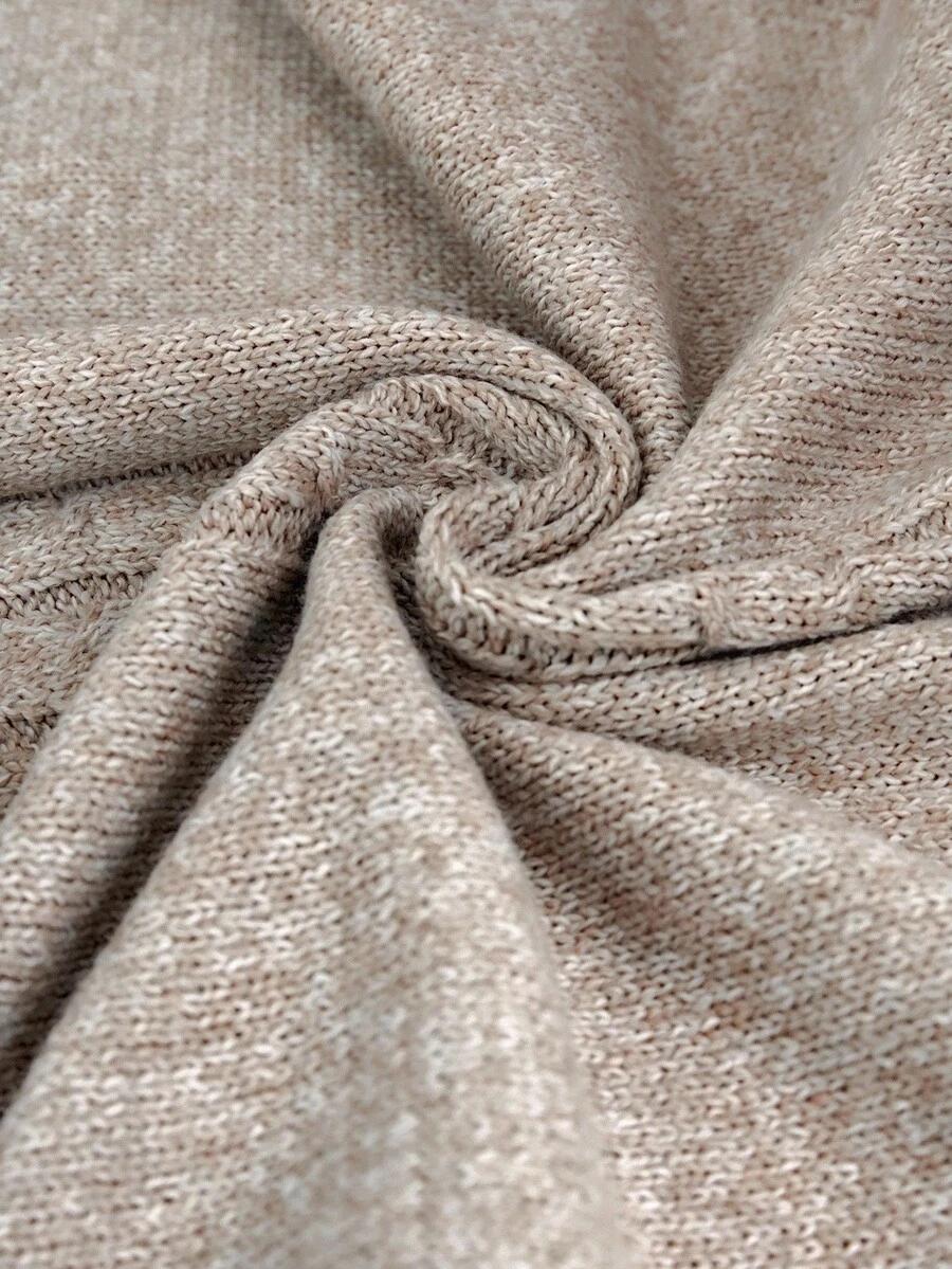beżowy sweter oversize