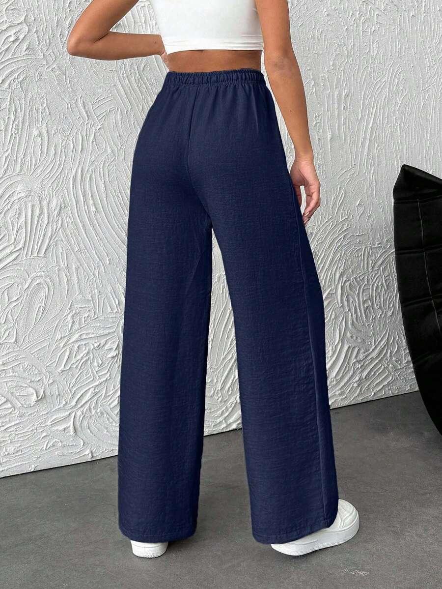 granatowe spodnie casual 