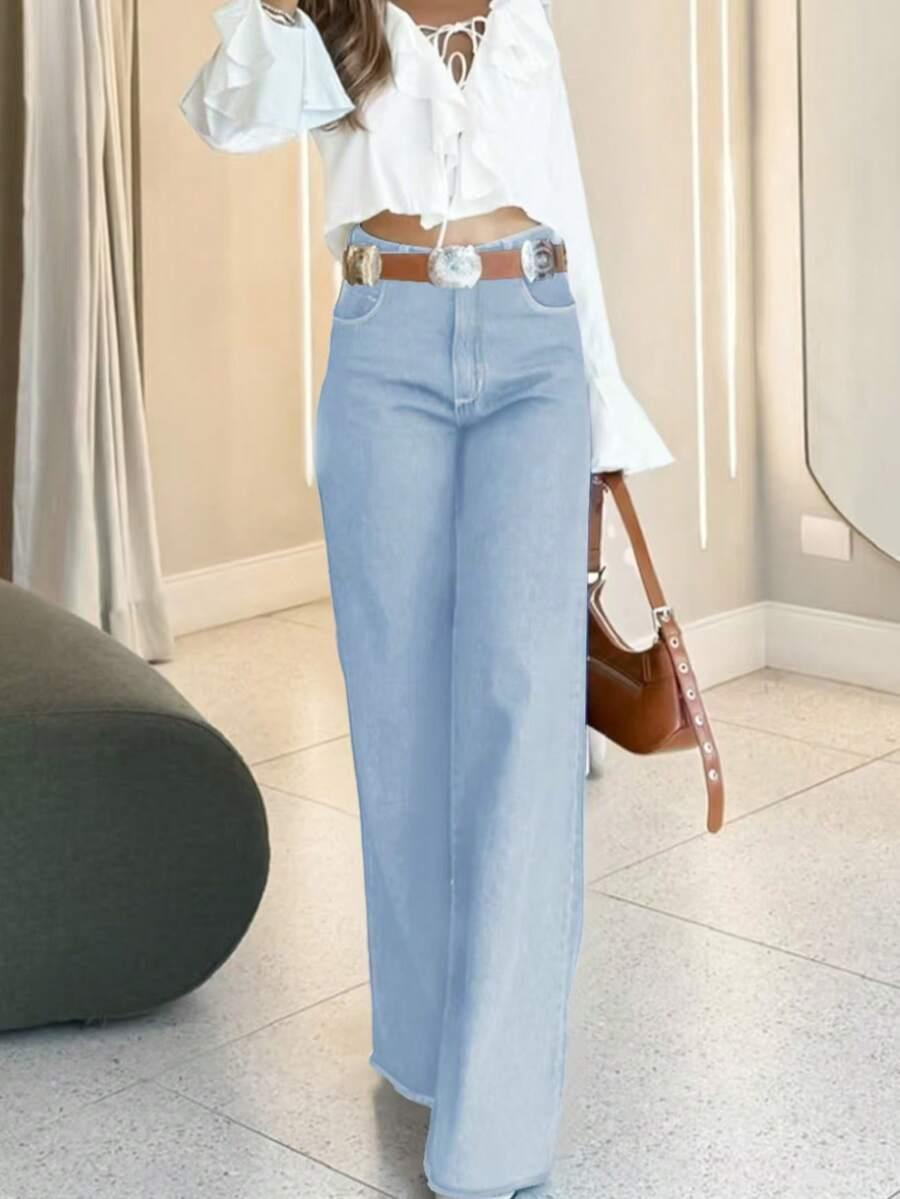 Niebieskie spodnie jeans
