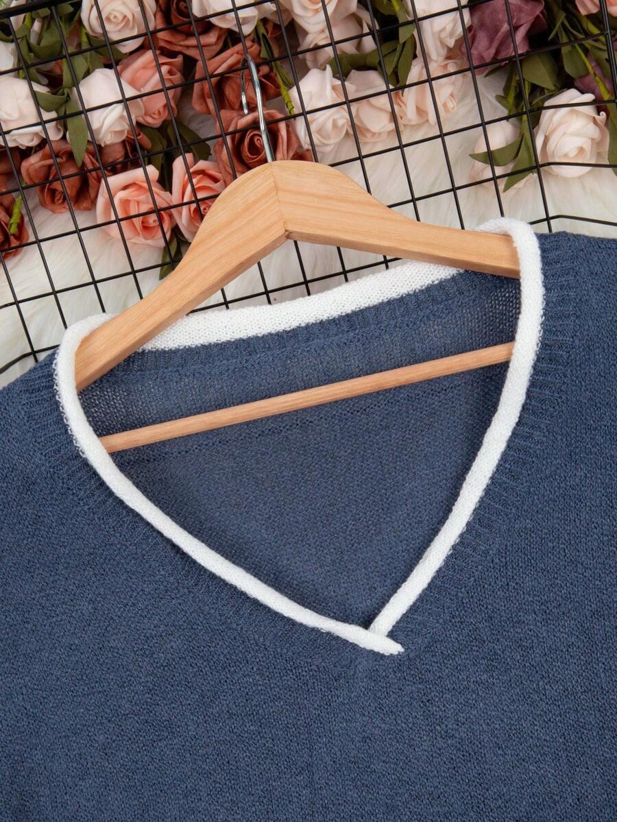 niebieski sweter v-neck
