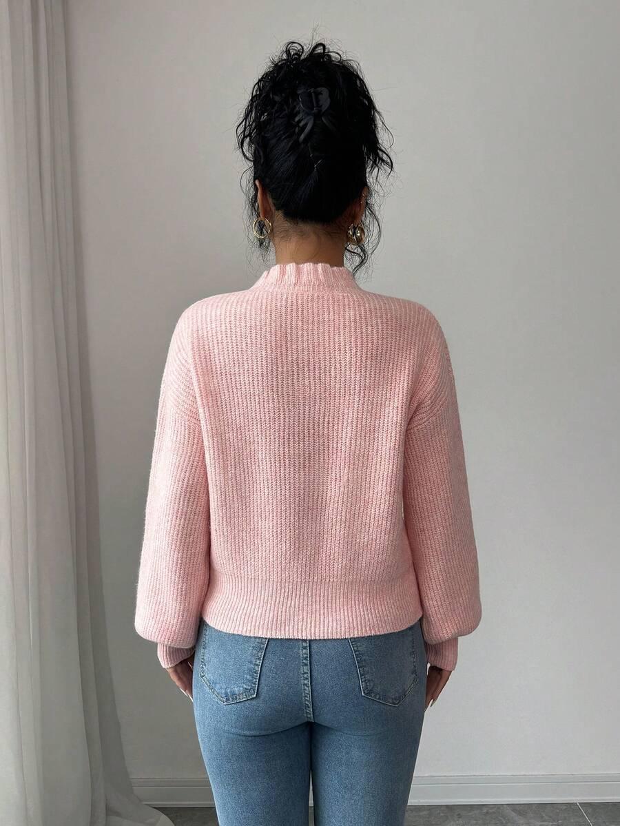 różowy sweter długi rękaw