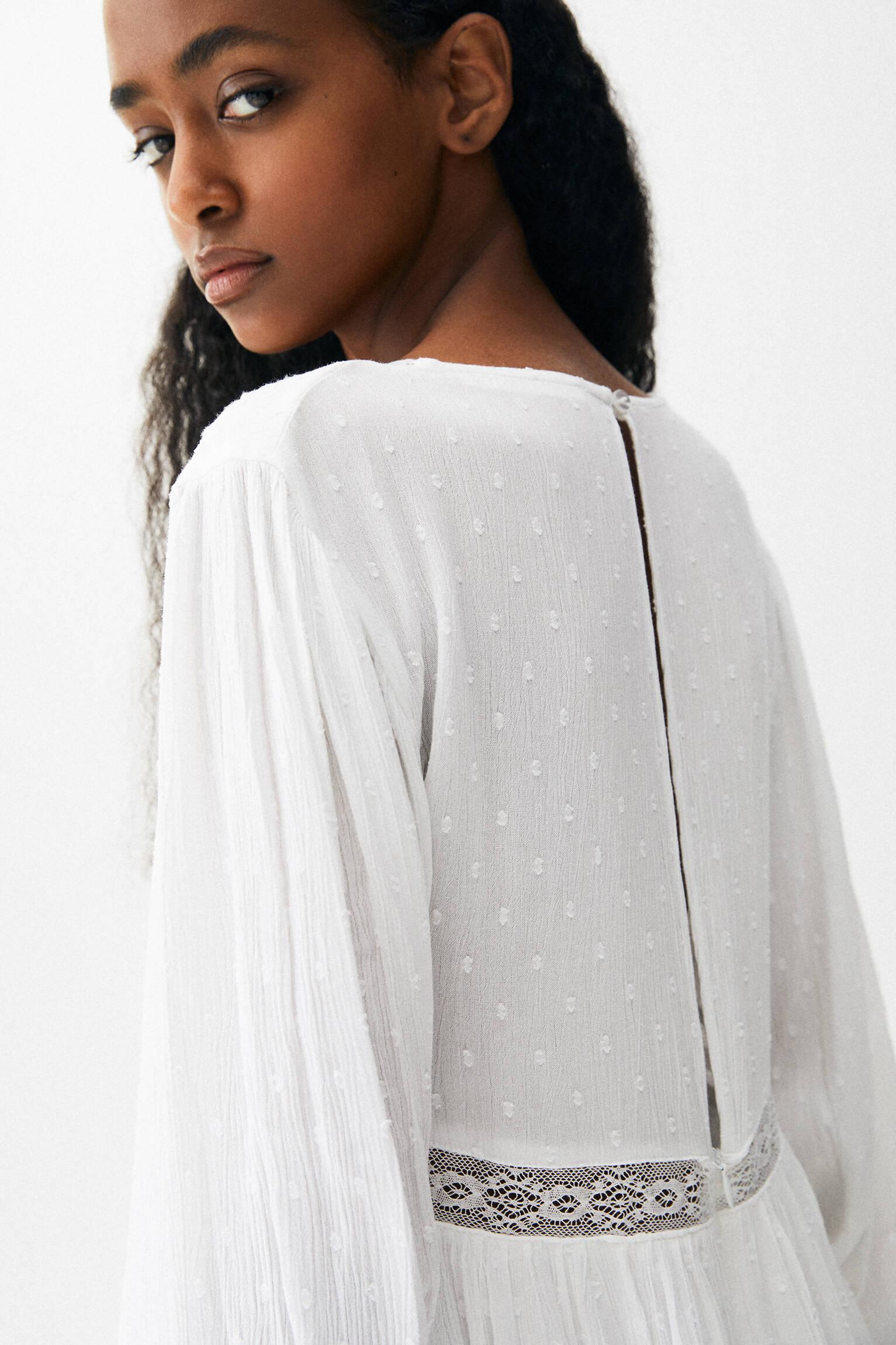 biały kombinezon v neck koronka