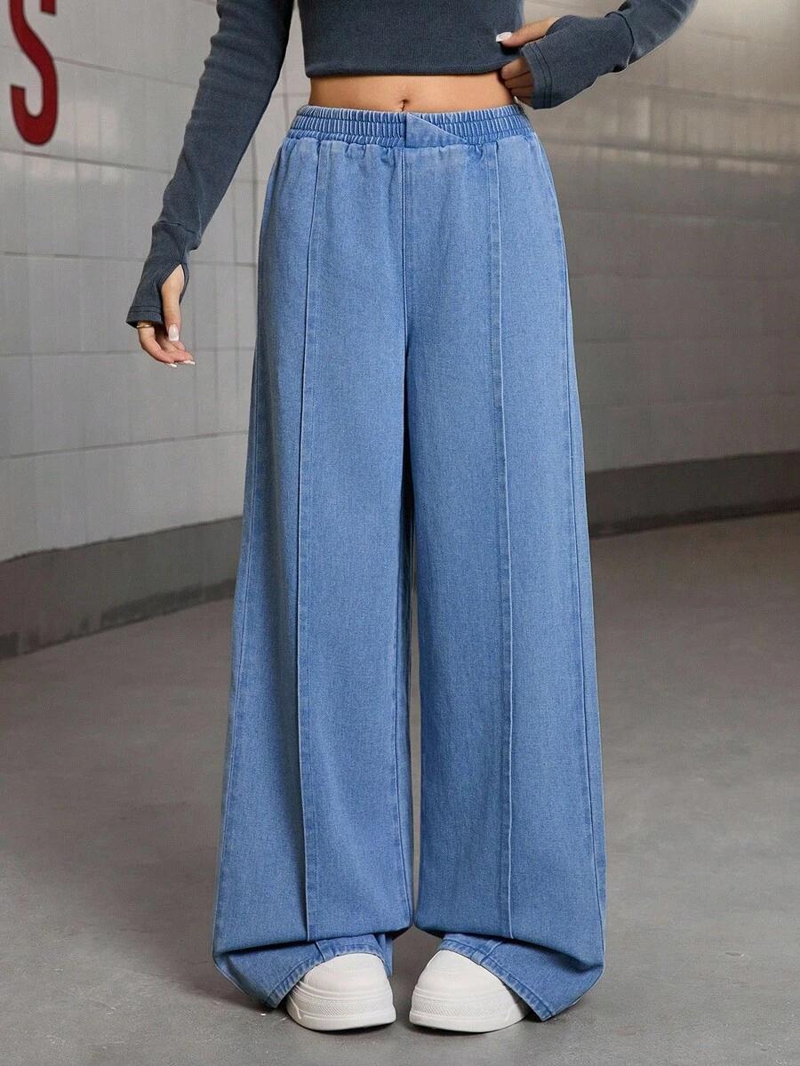 niebieskie spodnie jeans