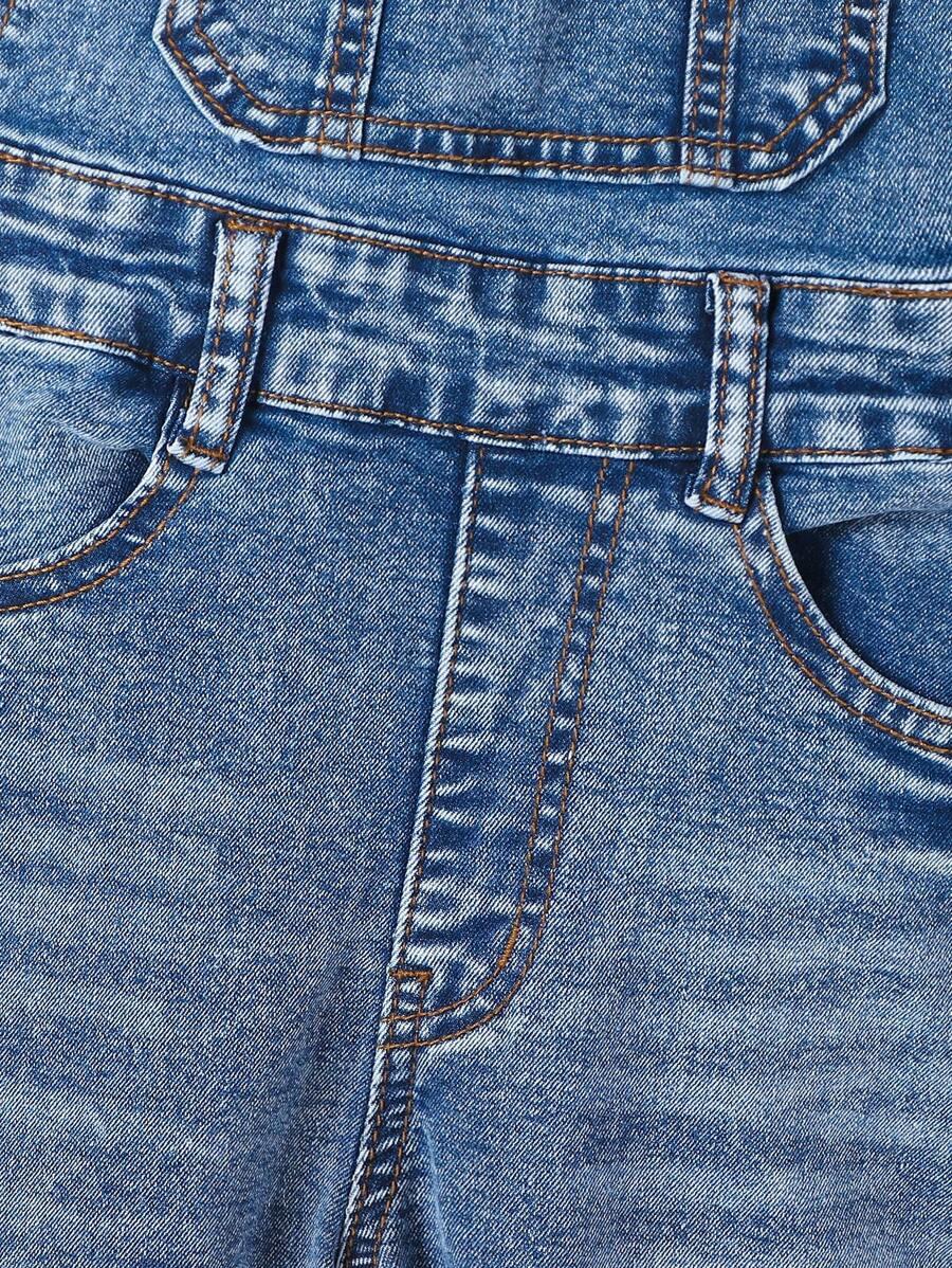 niebiskie ogrodniczki jeans