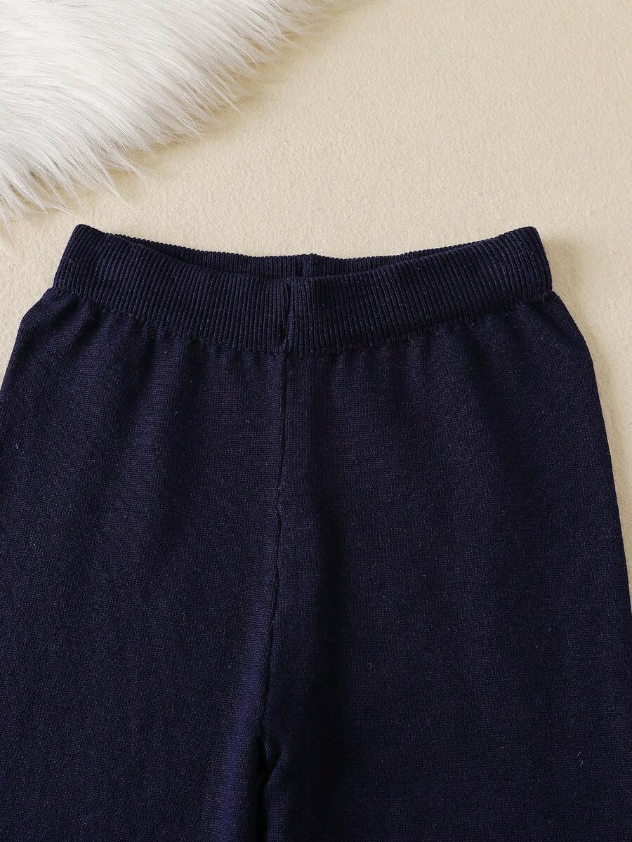 granatowy komplet sweter spodnie 
