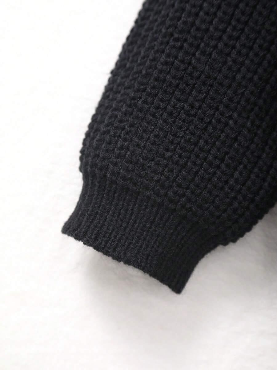 klasyczny czarny sweter