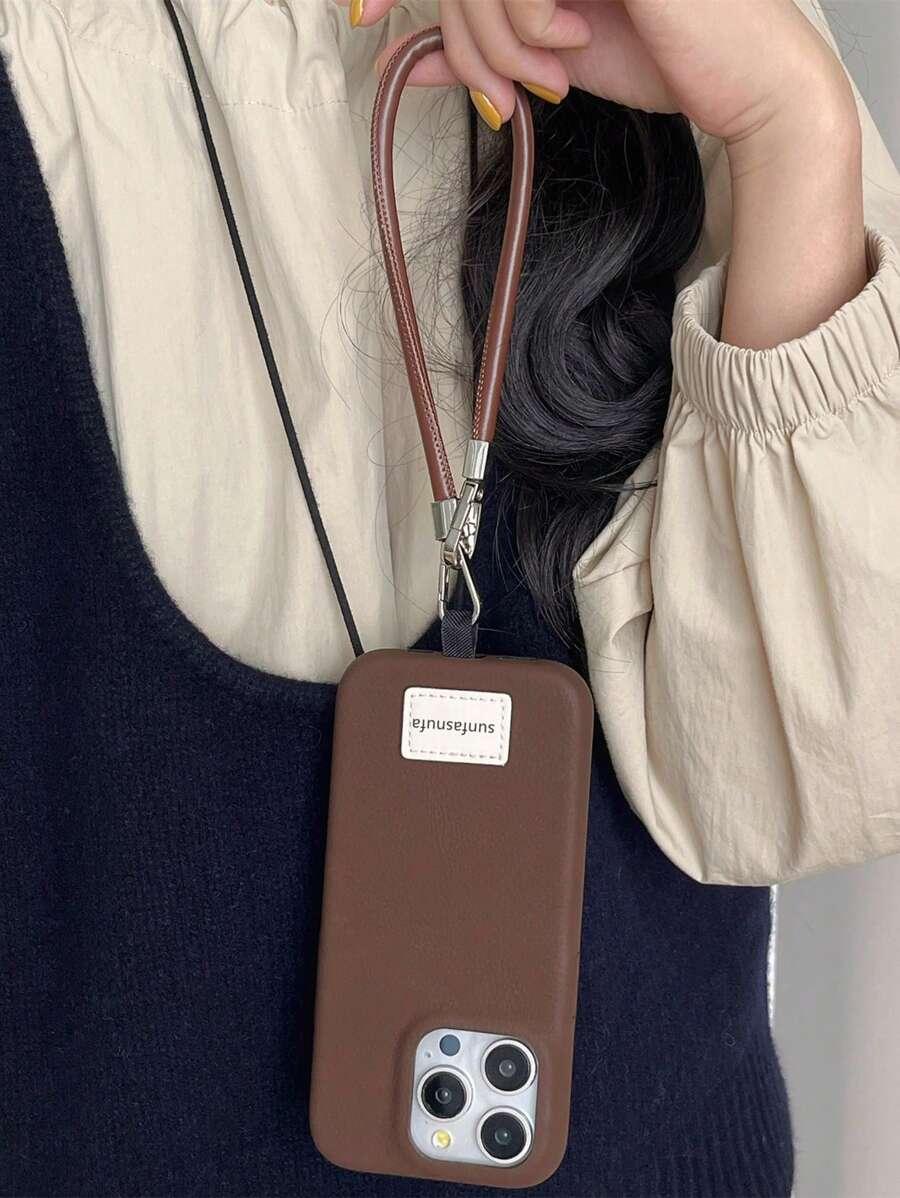 brązowe etui na telefon 