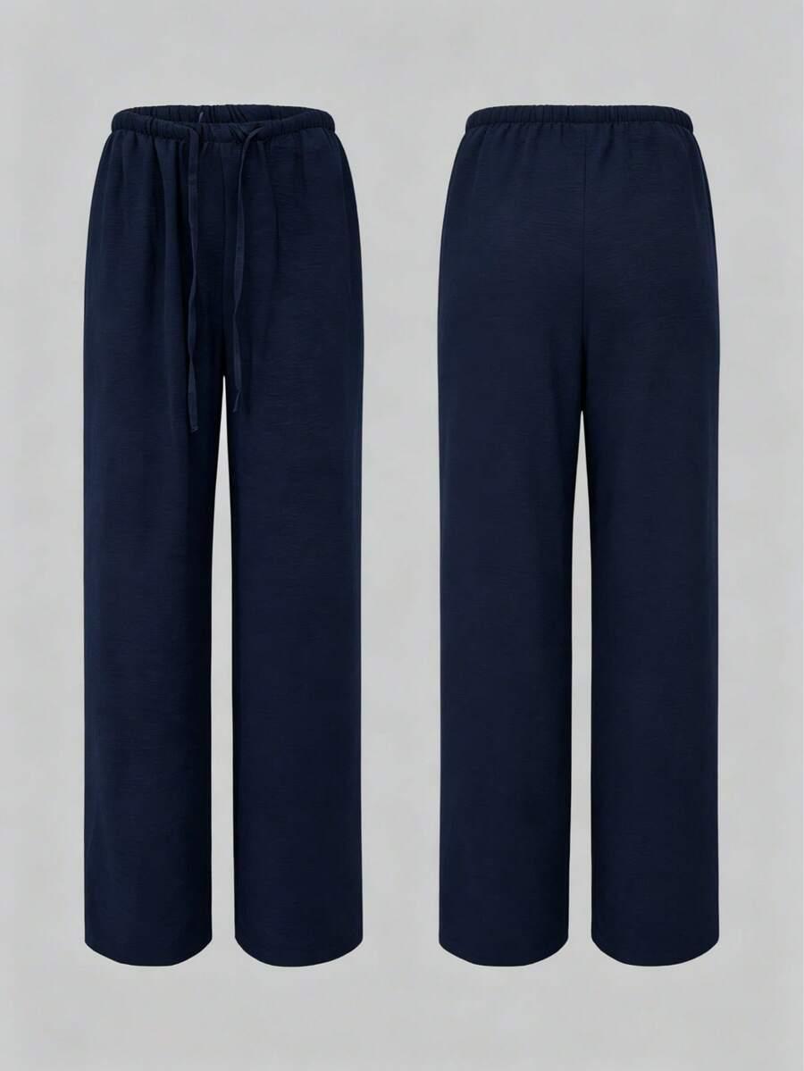 granatowe spodnie casual