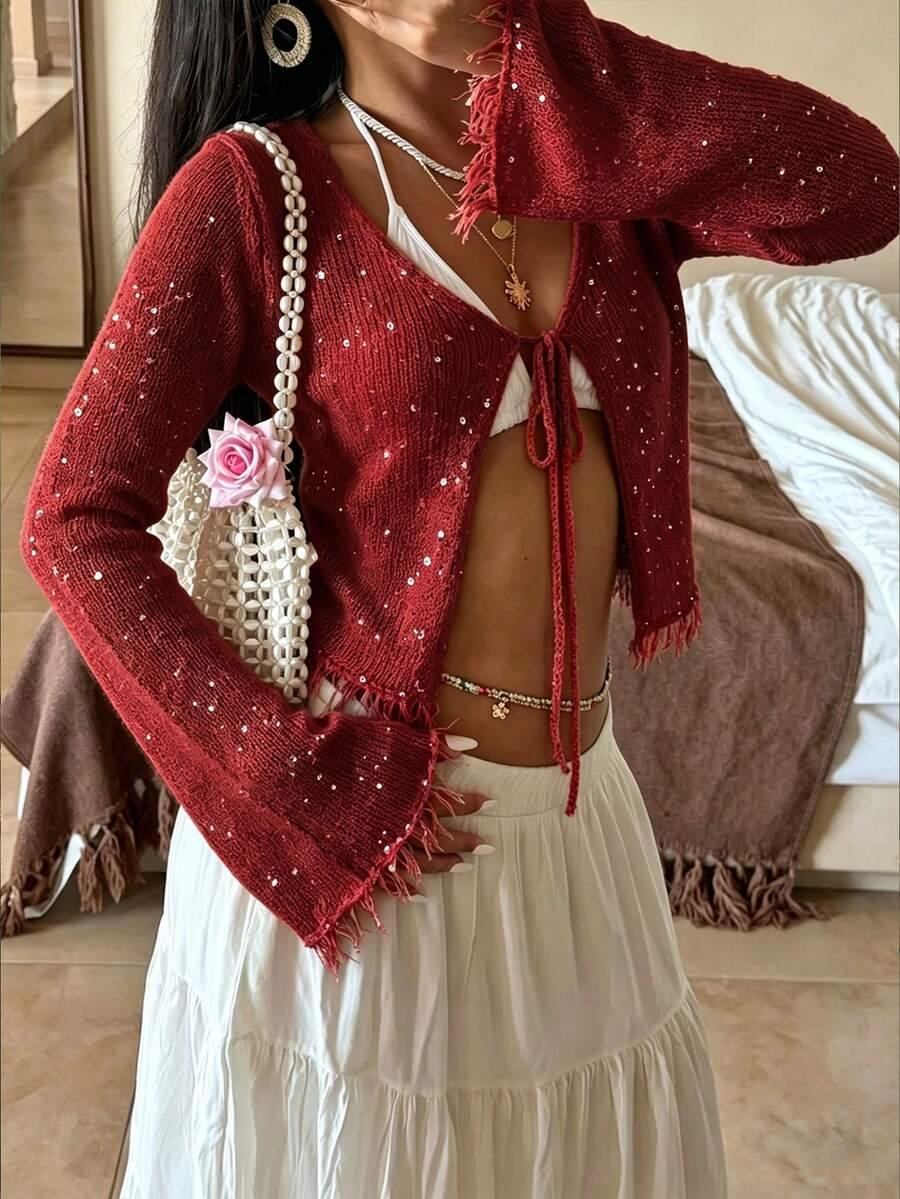 czerwony sweter zdobienia