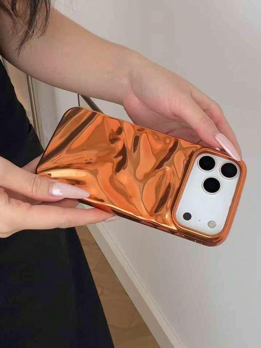 pomarańczowe etui na telefon 