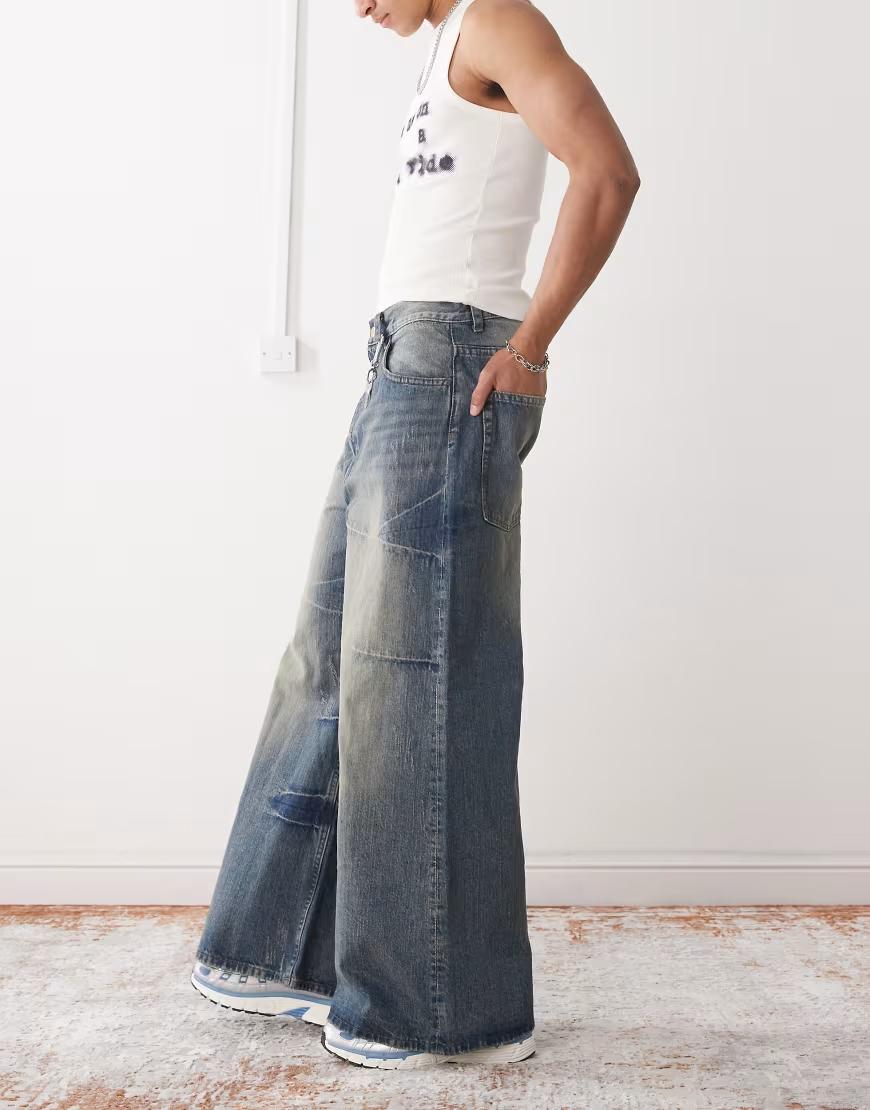 niebieskie spodnie jeans kieszenie