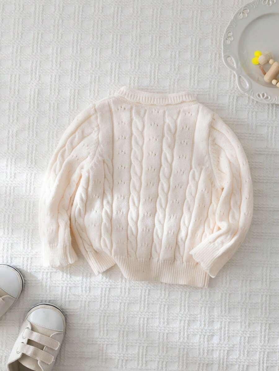 beżowy sweter guziki 