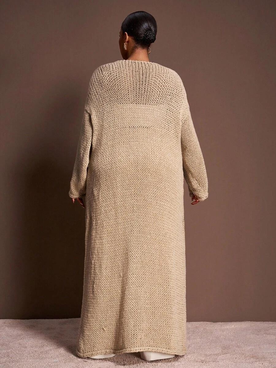 beżowy sweter do kostek