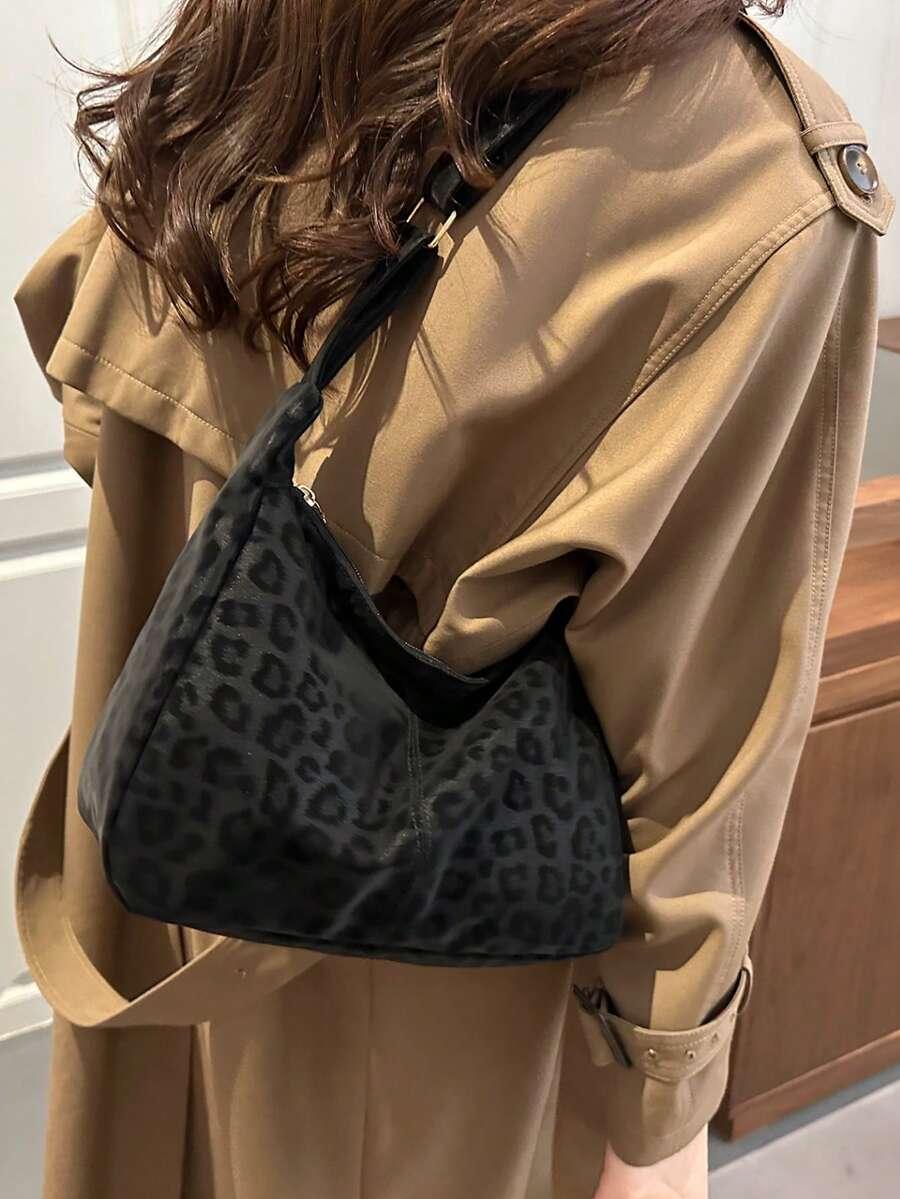 czarna torebka animal print
