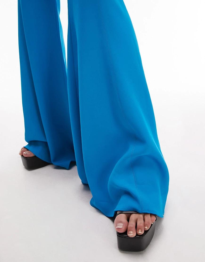 niebieskie spodnie z wysokim stanem szerokie nogawki