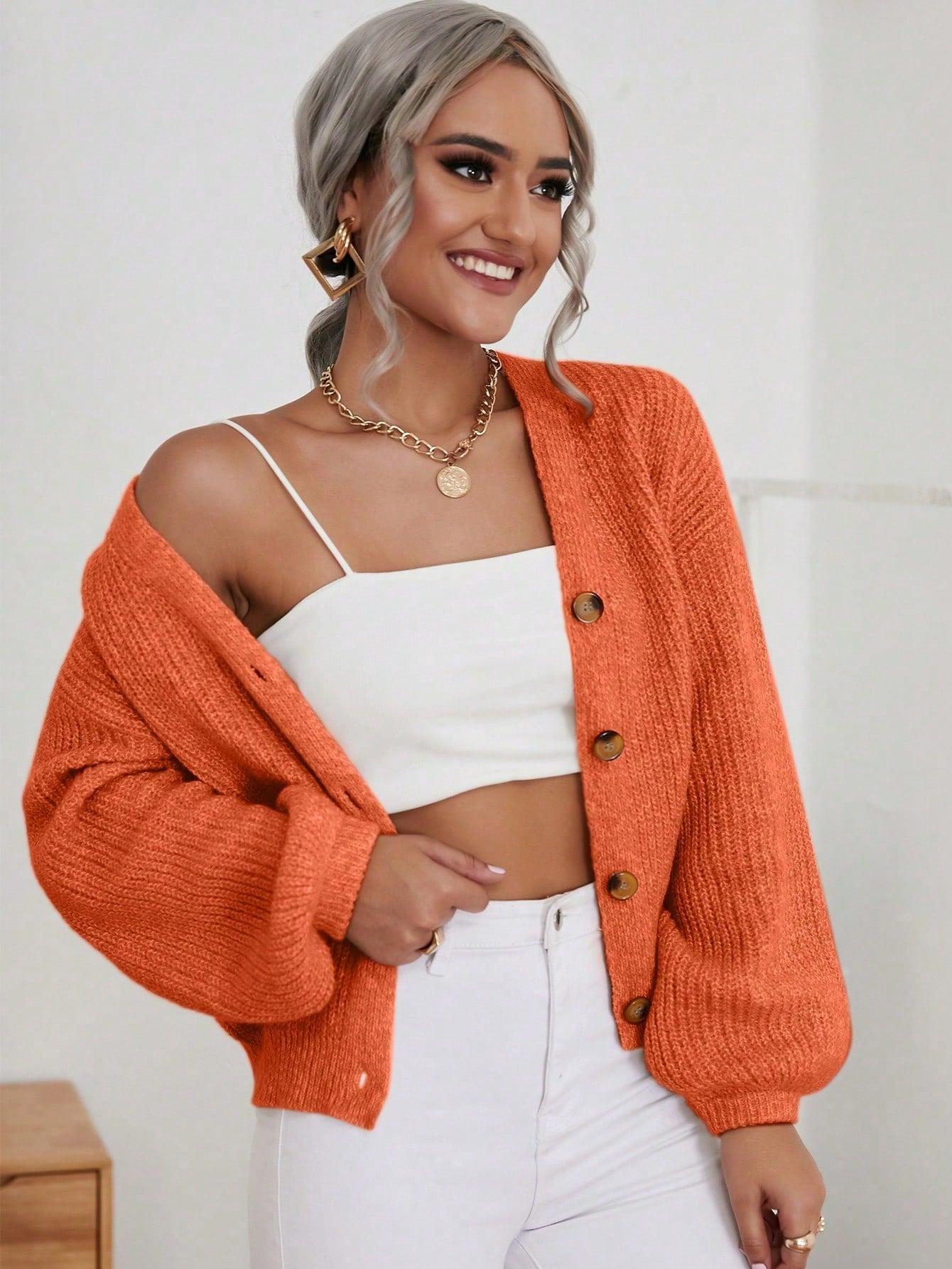 pomarańczowy rozpinany sweter