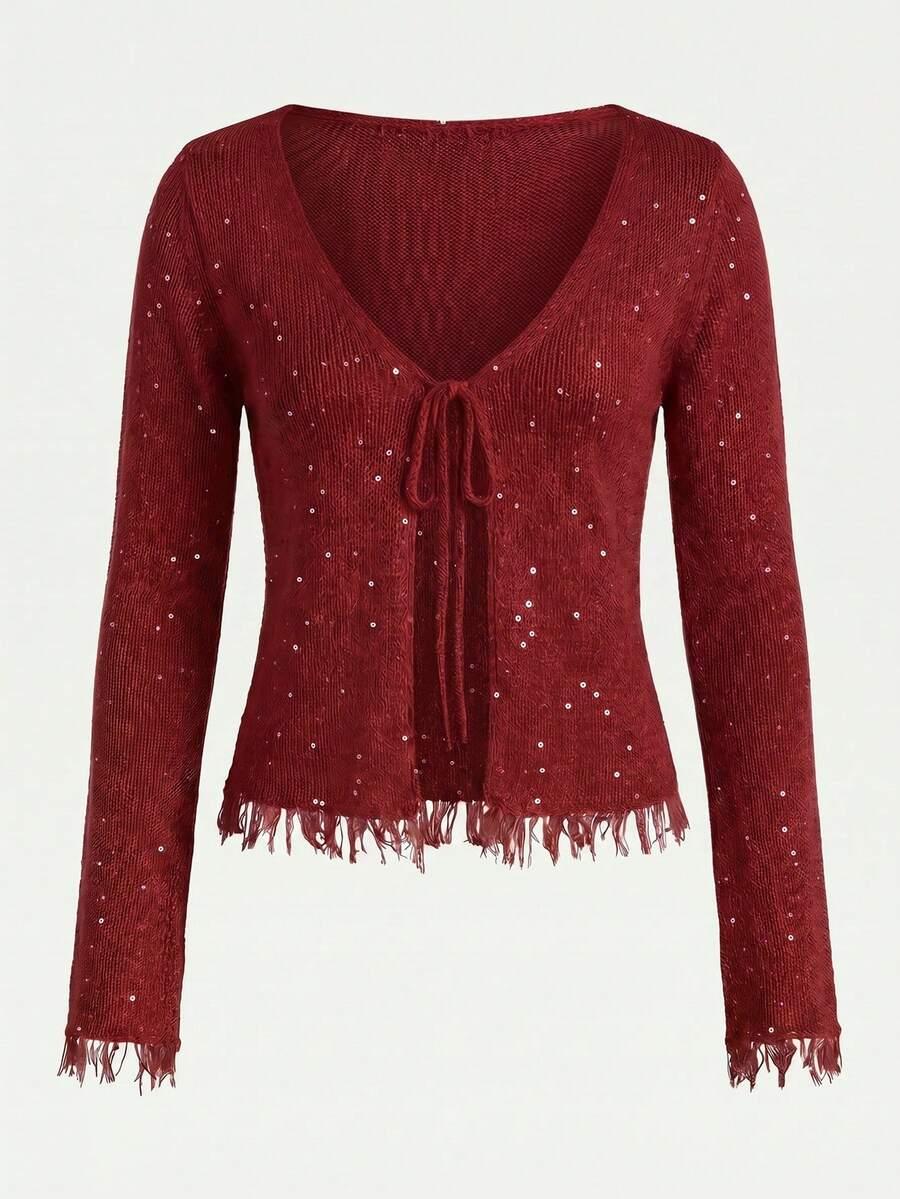 czerwony sweter zdobienia