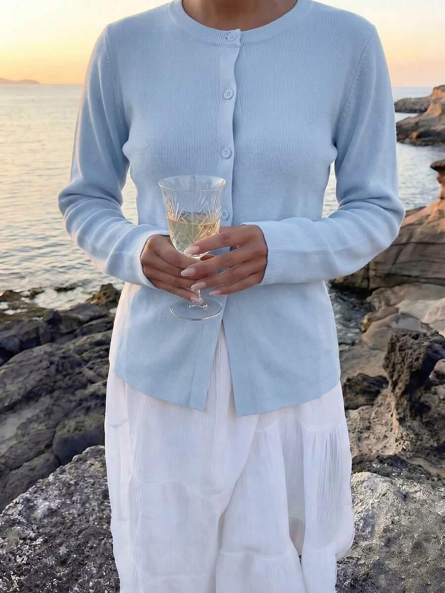 niebieski sweter guziki 