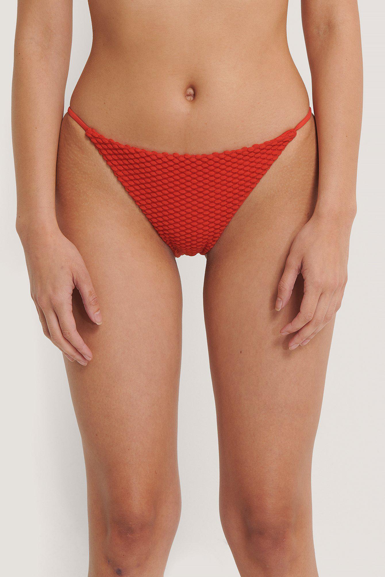 czerwony dół bikini struktura
