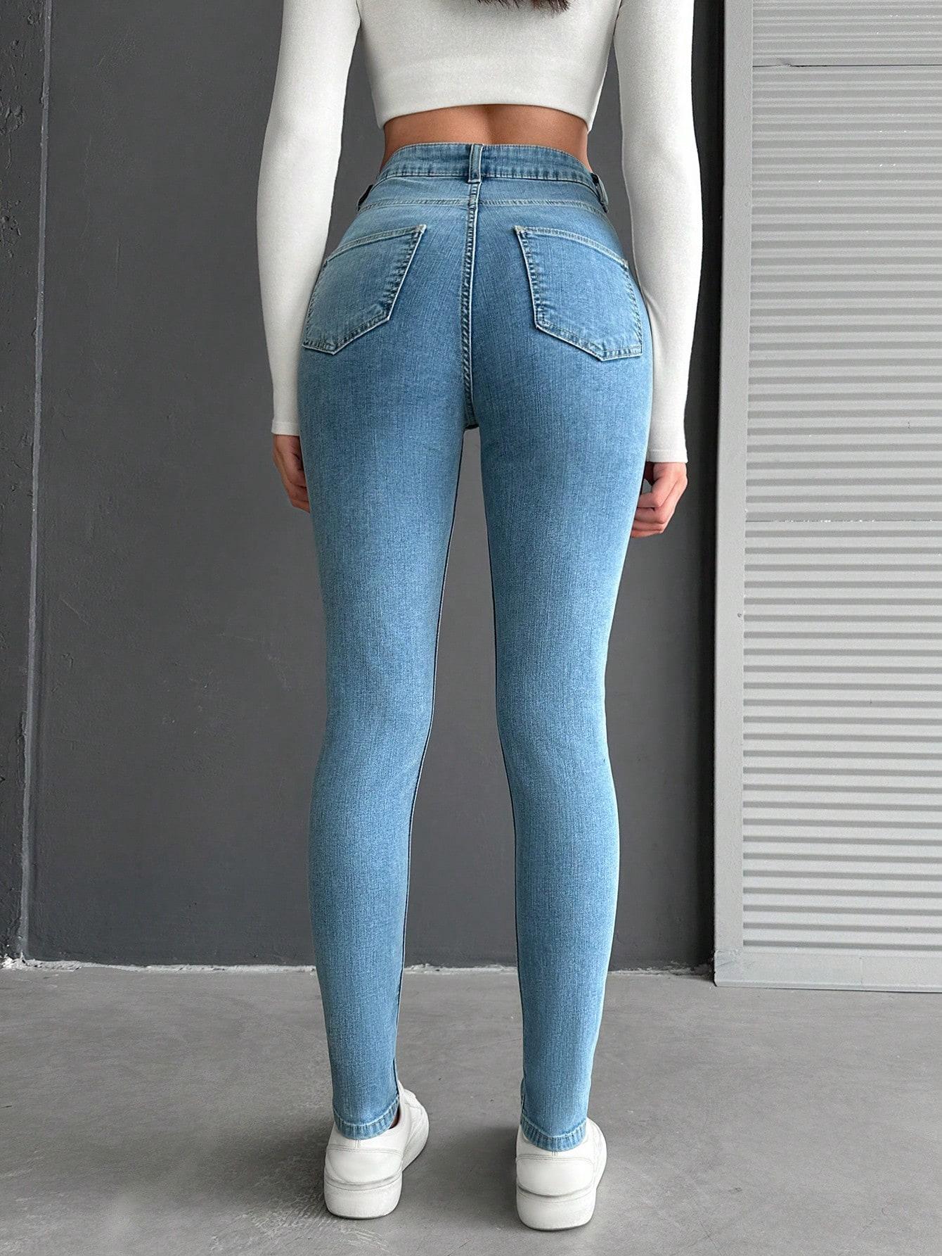 niebieskie spodnie rurki jeans high waist kieszenie