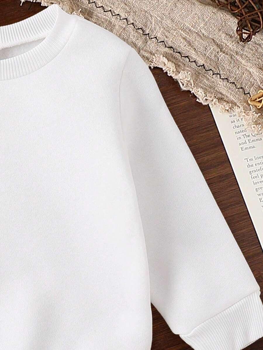 BIAŁA BLUZA PRINT 