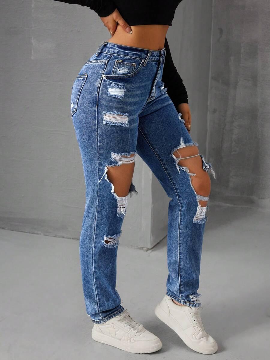 SPODNIE JEANS PRZETARCIA 