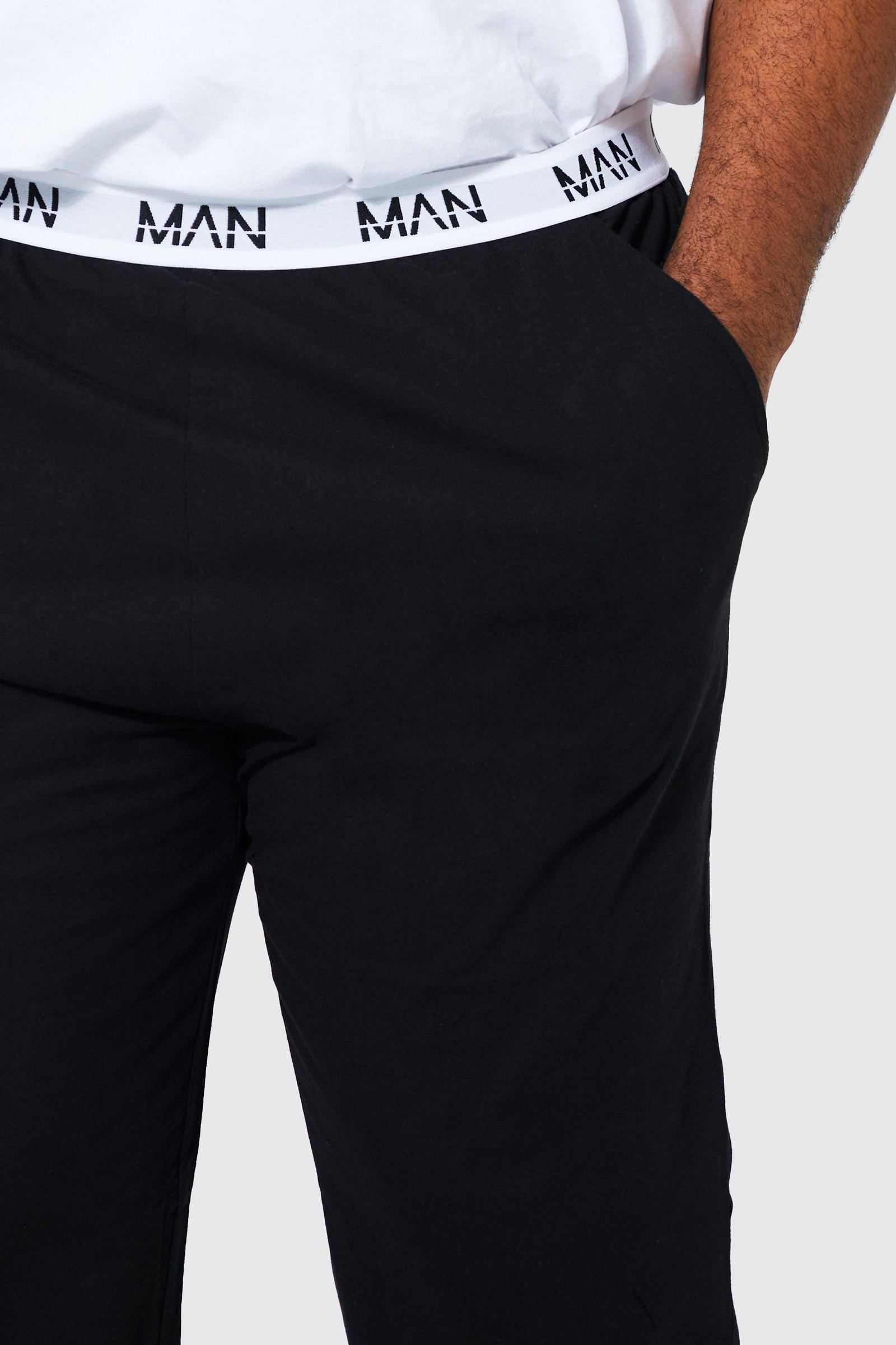 czarne spodnie od piżamy logo